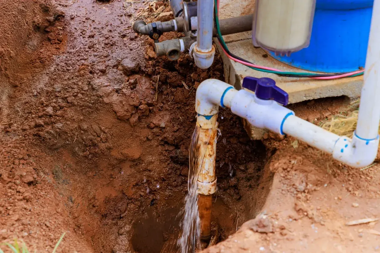 Submersible well pump pulled from a drilled bedrock well for repair