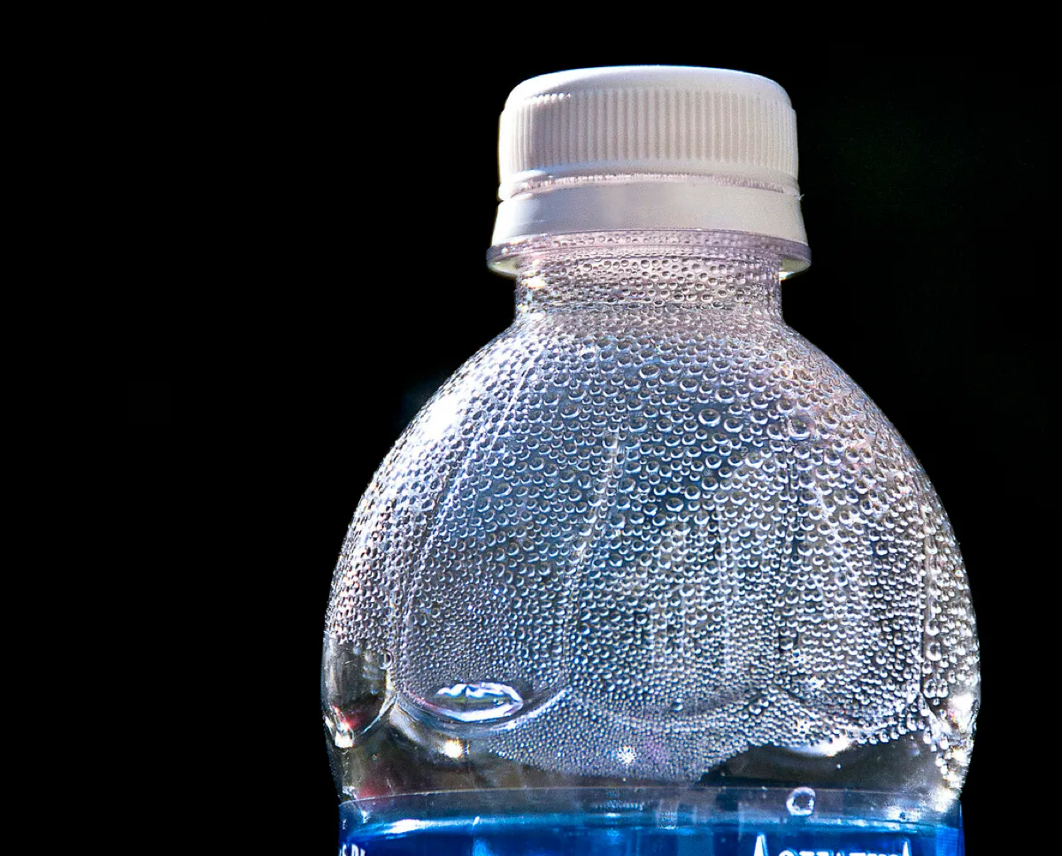 Well water sample bottles for arsenic and bacteria testing in Maine